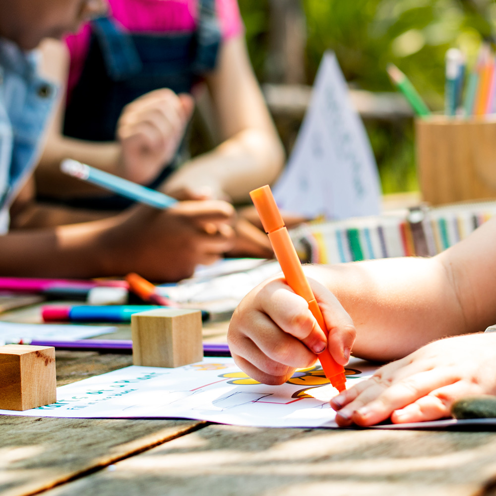 Children creating artwork together
